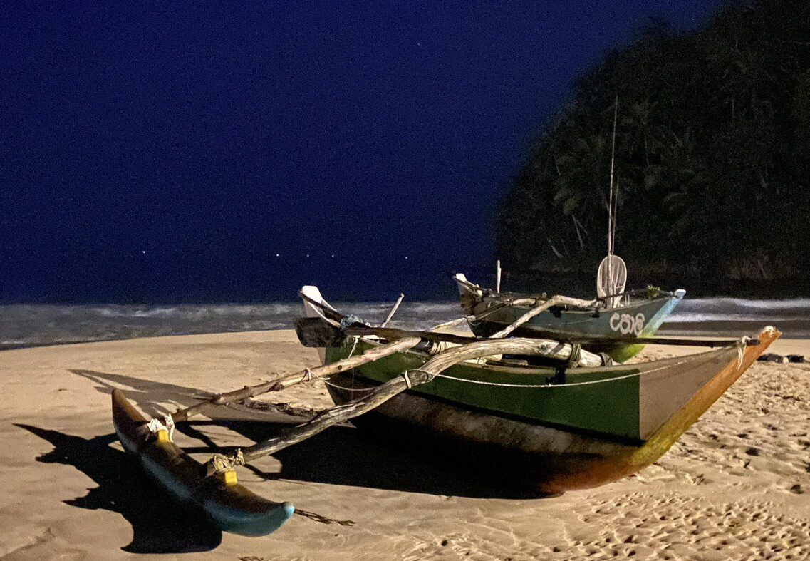 Boat by moonlight, Talalla beach, Sri Lanka