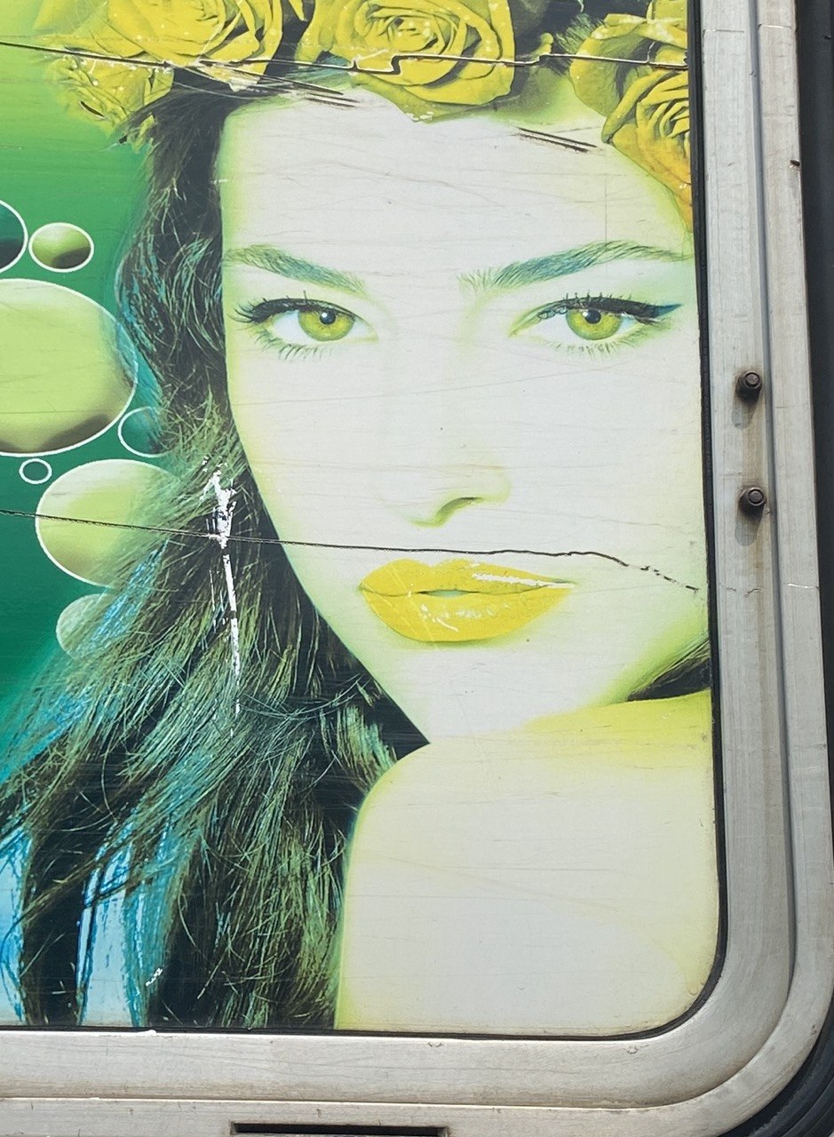 Sun-bleached bus ad, Sri Lanka